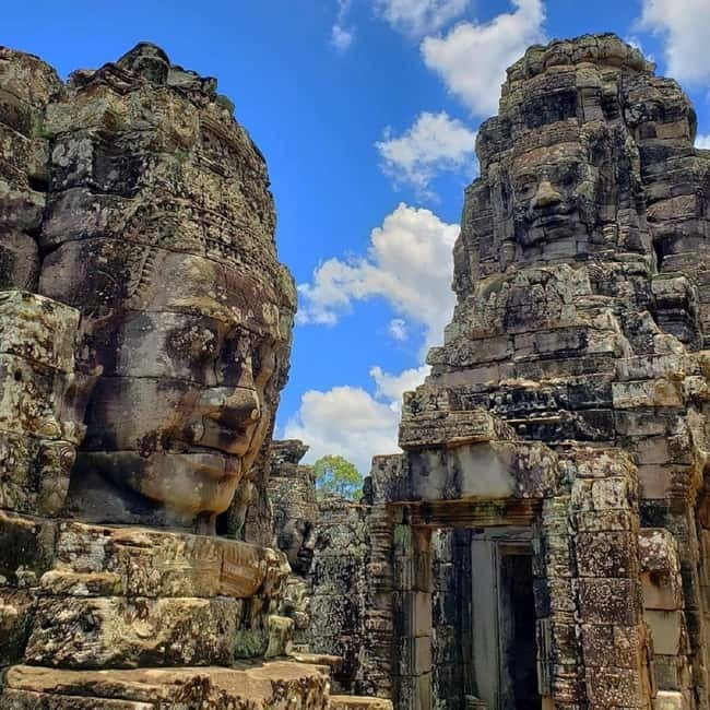 Siem Reap: 2-Day Private Angkor Wat & Angkor Temples Tour - Day 1: giant faces, tree roots, and Angkor Wat
