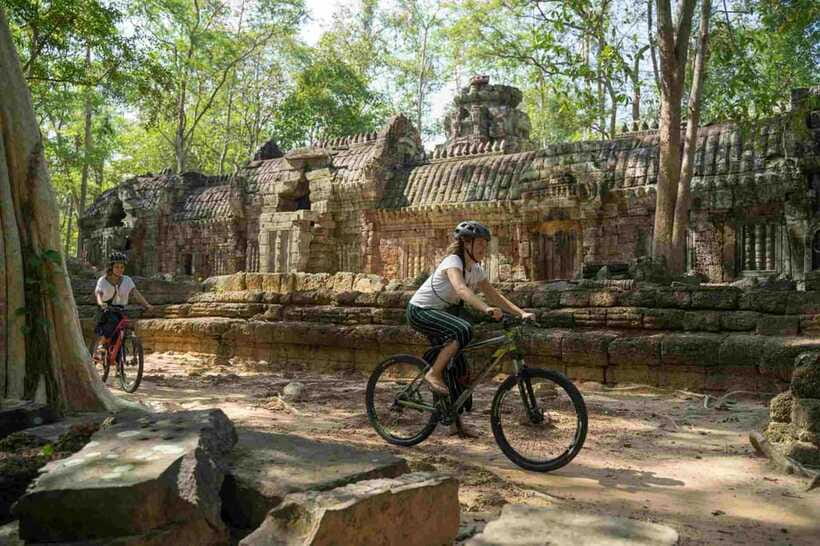 Siem Reap: Angkor Temples Off-Track Bicycle Tour - The guide, language, and pace