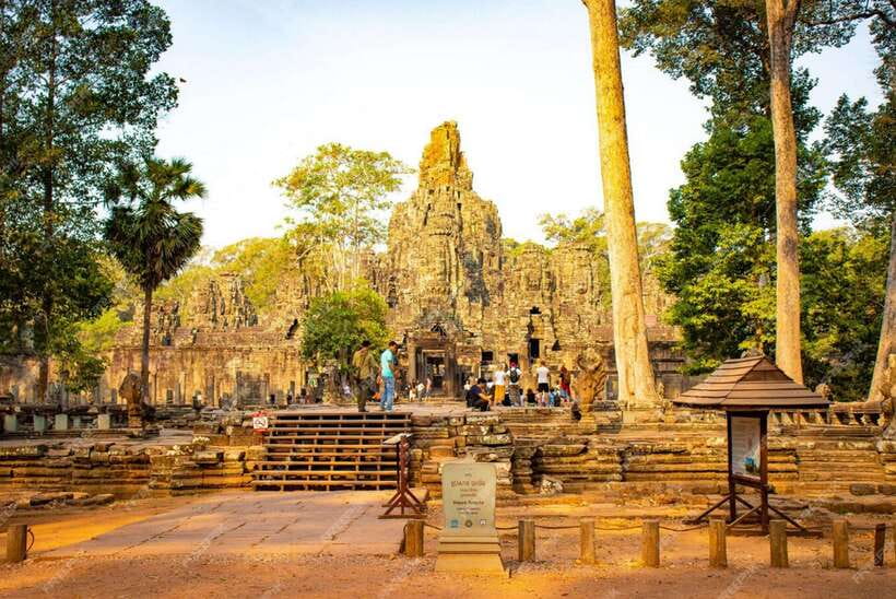 Siem Reap: Angkor Temples Tour - Shared Tours tours guide - Ta Prohm, where trees frame the ruins