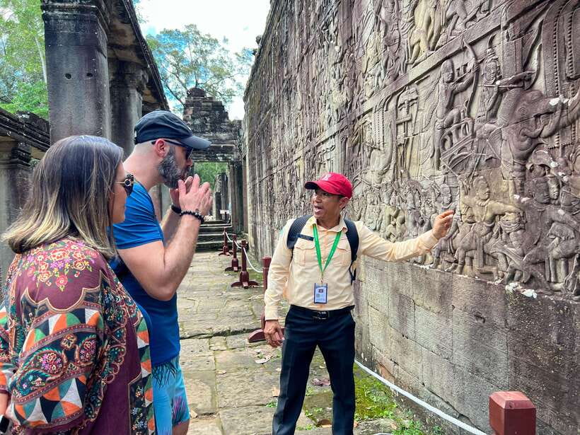 Siem Reap: Angkor Wat Sunrise and Market Tour by Jeep - Bayon’s stone faces reward a slow look