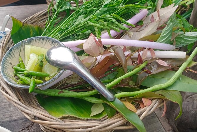 Siem Reap Authentic Breakfast and Market Tour - Stop one at Yey Tep Shrine: noodles with flowers and herbs