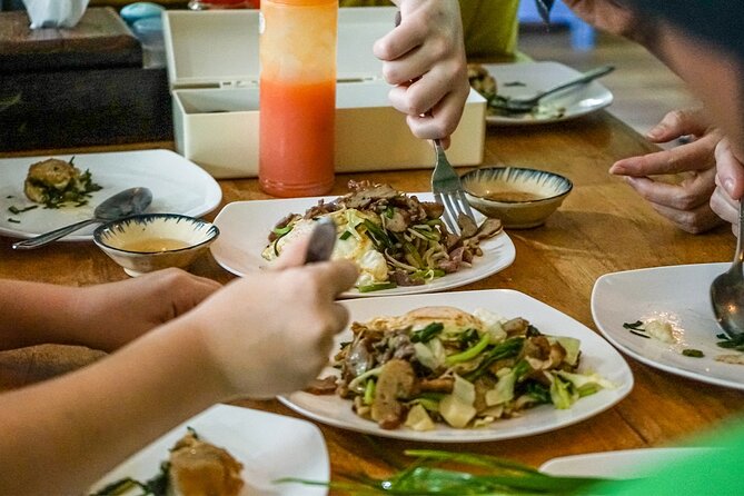 Siem Reap Evening Food Tour - Inclusive 5 stops Local Tastings - Local restaurant tastings, herbs, spring rolls, and BBQ snails