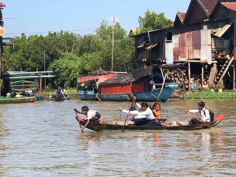 Siem Reap Floating Village Kampong Phluk Sunset with Boat - Reaching the stilted homes of Kampong Phluk