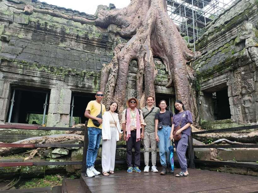 Siem Reap: Full-Day Angkor Wat Guided Tour with Sunset - Angkor Thom and Bayon: royal power and stone faces