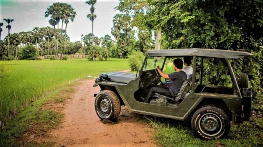 Siem Reap: Guided Countryside Sunset Tour by Jeep - Leaving Siem Reap by open jeep
