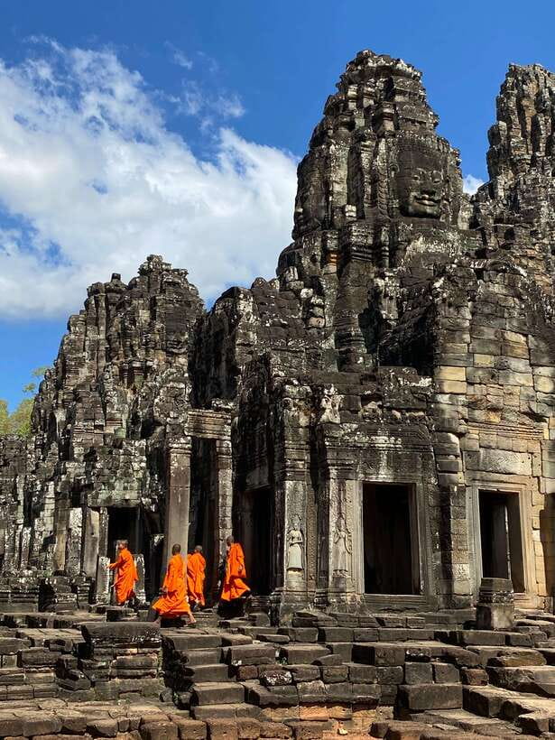 Siem Reap: Personalized Angkor Wat Sunrise/Set by TukTuk/Car - Bayon and the stone faces of Angkor Thom