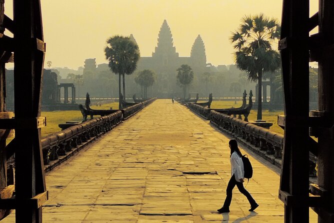 Siem Reap Private Day Tour: Angkor Wat Sunrise, Bayon & Ta Prohm - Bayon and the faces of Angkor Thom