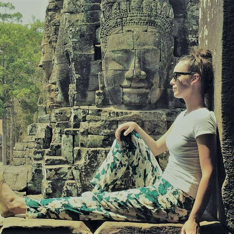 Siem Reap Private Tour: Angkor Wat Sunrise And Banteay Srei - Bayon’s stone faces in Angkor Thom
