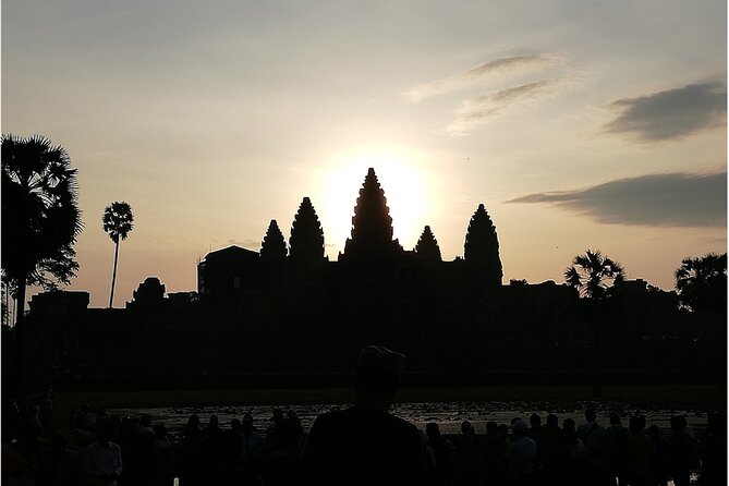 Sunrise Small Group Tour to Angkor Wat Temple - Angkor Thom brings stone faces and royal scale