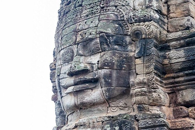 Sunrise Tour of Angkor Temples from Siem Reap - Bayon’s stone faces and narrow corridors