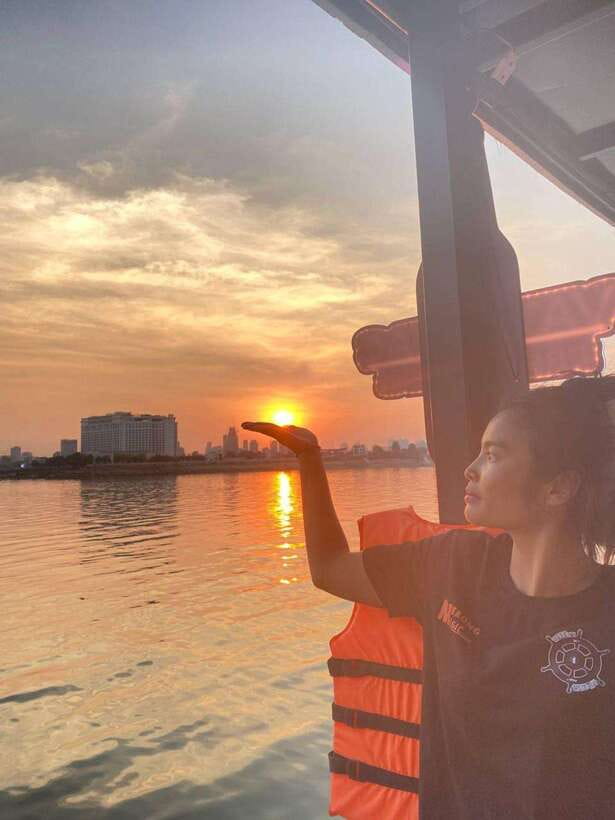 Sunset Cruise Unlimited BBQ Buffet, Cold Beers, Soft Drinks<em> – Phnom Penh at sunset, seen from the Mekong’ /></p>
<p><p>This is a straightforward river outing, not a formal sightseeing tour with a long historical talk. Its appeal is the change of view. From the boat, you see Phnom Penh from the broad river rather than from a road or temple courtyard.</p>
</p>
<p><p>The trip begins near the end of the afternoon. If you take the scheduled 5 pm sailing, the first part of the cruise offers daylight views of the riverbanks. As the boat moves through the Mekong, Tonle Sap, and Four Faces rivers, you may see local fishing boats, riverside homes, traditional stilted houses, and the steady movement of life on the water.</p>
</p>
<p><p>The city skyline is the main event. The sun sets behind Phnom Penh, and the Royal Palace area becomes part of the wider riverside view. On a clear evening, this makes a fine photo opportunity. On a cloudy evening, the city lights still give you something to watch as darkness settles.</p>
</p>
<p><p>I would choose this cruise for the atmosphere rather than for detailed commentary. The crew speaks Cambodian and English, but the experience is mainly about sitting back, eating, drinking, and looking outward. One review specifically noted that there was no guide or regular explanation of the sights, so bring your own curiosity and do not expect a narrated city tour.</p>
</p>
<div class="twil" style="margin: 20px 0; padding: 15px 0;"><p>More Sunset Cruises in Phnom Penh</p><ul style="margin: 10px 0; padding-left: 0; list-style: none;"><li style="margin: 0 0 12px 0; padding: 0 0 12px 0; border-bottom: 1px solid #FDEDDE; line-height: 1.4;"><a href="https://introducingcambodia.com/phnom-penh-sunset-cruise-with-unlimited-beers-bbq-buffet/">Phnom Penh: Sunset Cruise with Unlimited Beers & BBQ Buffet</a><br><span style="font-size: 0.82em; color: #555;"><span style="color: #F07C10;">★</span> 4.5 &nbsp;&middot;&nbsp; 727 reviews</span></li><li style="margin: 0 0 12px 0; padding: 0 0 12px 0; border-bottom: 1px solid #FDEDDE; line-height: 1.4;"><a href="https://introducingcambodia.com/phnom-penh-sunset-cruise-with-unlimited-beer-fruit-platter/">Phnom Penh: Sunset Cruise with Unlimited Beer &Fruit platter</a><br><span style="font-size: 0.82em; color: #555;"><span style="color: #F07C10;">★</span> 4.7 &nbsp;&middot;&nbsp; 515 reviews</span></li><li style="margin: 0; padding: 0; border-bottom: none; line-height: 1.4;"><a href="https://introducingcambodia.com/sunset-cruise-with-unlimited-beer-soft-drinks-english-speaking-guide-on-board/">Sunset Cruise with unlimited beer & soft drinks -English speaking guide on board</a><br><span style="font-size: 0.82em; color: #555;"><span style="color: #F07C10;">★</span> 5.0 &nbsp;&middot;&nbsp; 419 reviews</span></li></ul></div><h2>Getting to the dock by tuk-tuk</h2>
<p><img width="820" height="544" decoding="async" src=