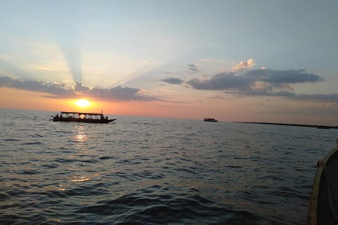 Sunset Dinner and drinks includes a Floating Village cruise tour. - Dinner, cocktails, and the value of the package