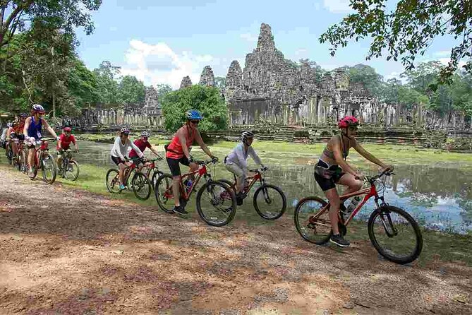 Sunset or sunrise bicycle tour around Angkor Wat and nearby temples - Angkor Thom and the Bayon faces