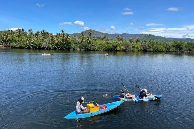 Sunset Scenic Kayaking and Swimming Activity - Paddling under Kampot’s Green Cathedral