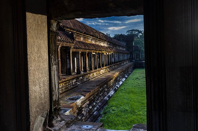 The Magnificent Angkor Wat - Ta Prohm, where trees take over the ruins