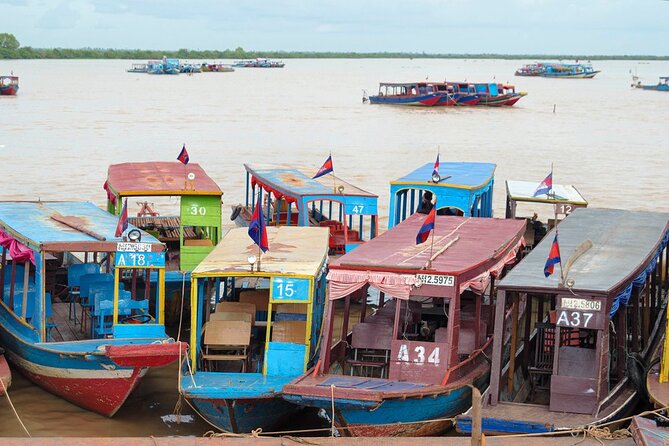 Tonle Sap Lake & Kampong Khleang Village Day Tour - Boarding the Private Boat at Khleang River